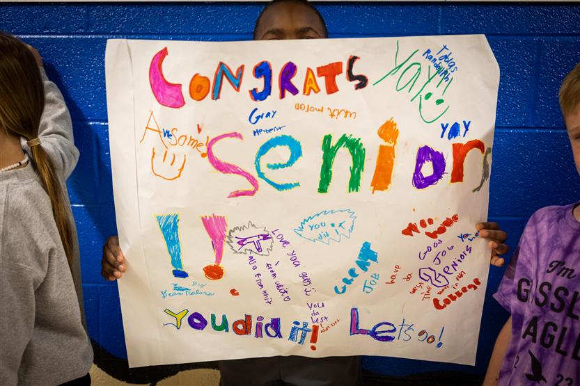 Students participate in a senior walk